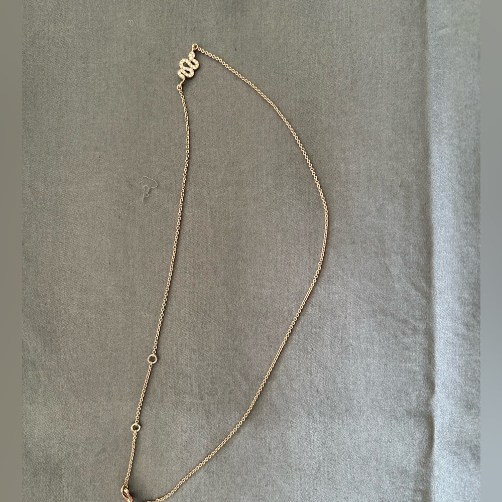 Rose gold necklace with cz snake.